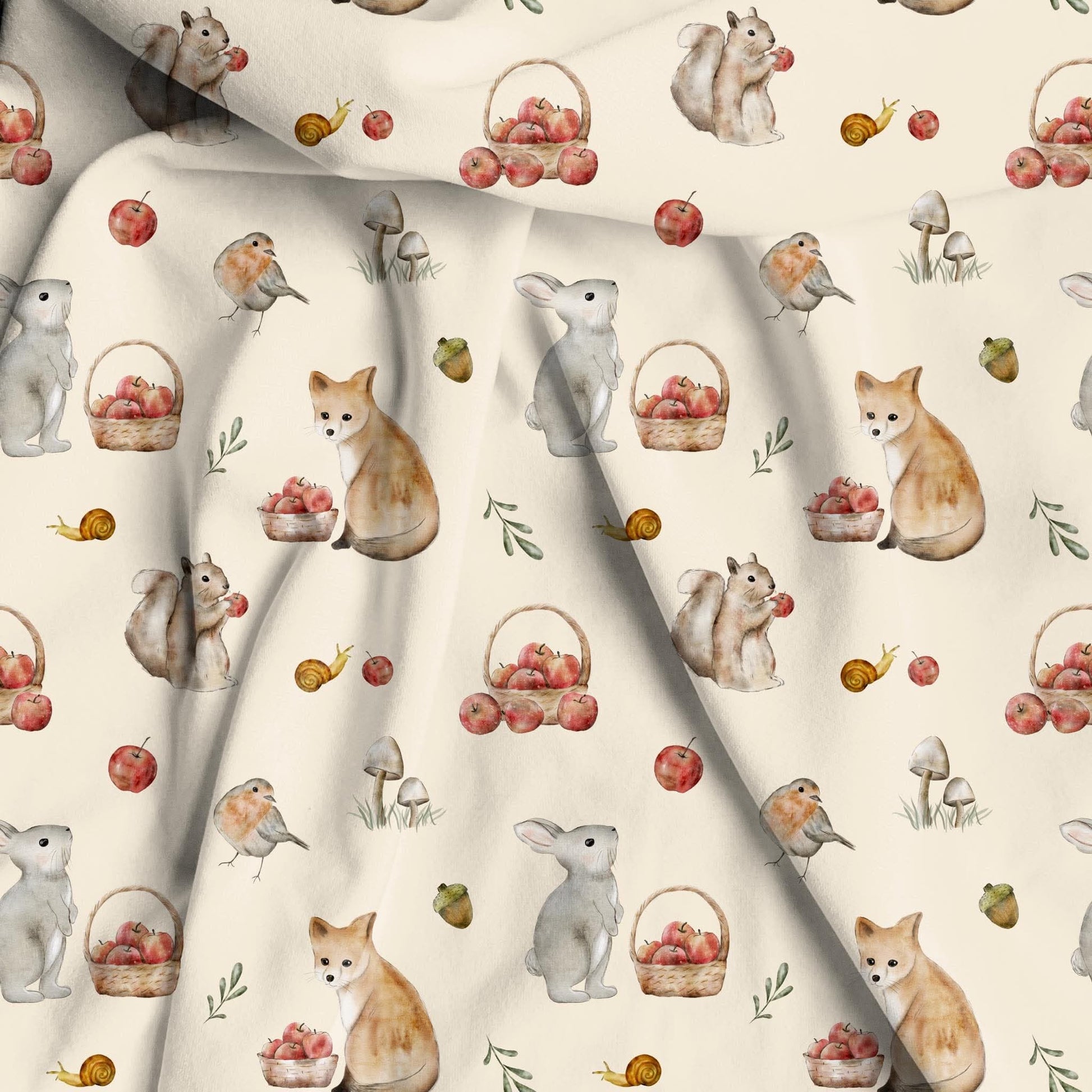 Bamboo viscose fabric woodland and orchard print. Woodland animal repeated pattern with apples and fall animals on a soft beige background. 