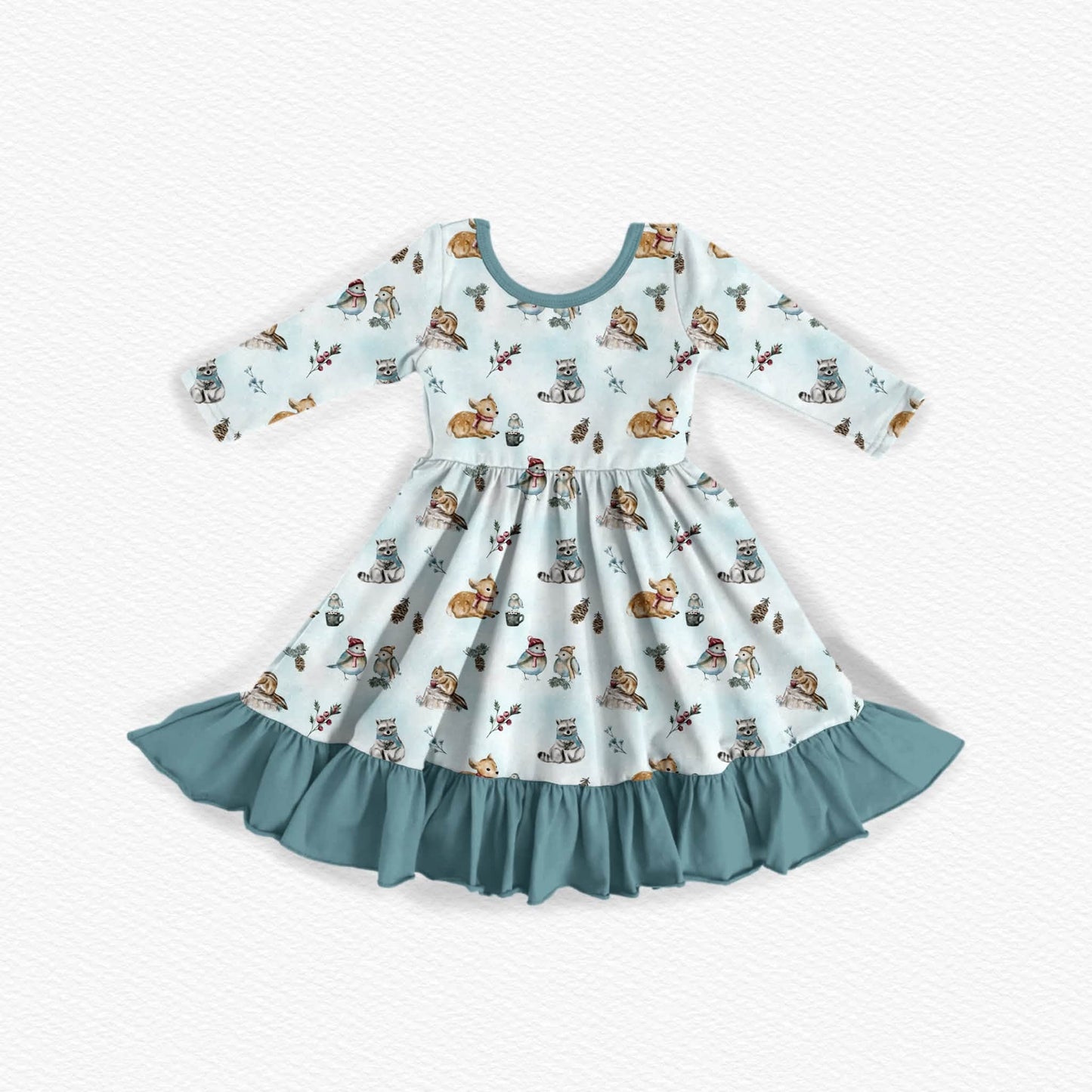 Long-sleeve bamboo dress with a winter woodland animal design. Featuring raccoons, fawns, chipmunks, and songbirds sharing hot cocoa on a snowy winter day. Teal neckline and ruffles for the bamboo twirl dress. 